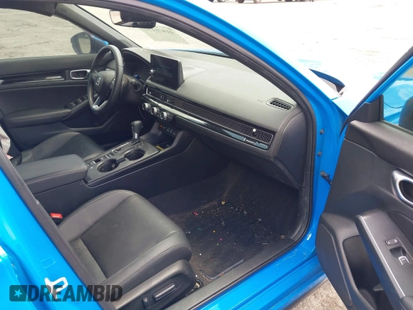 2023 Honda Civic Sport Touring z VIN 19XFL1H84PE002868, wystawiony jako IAAI lot #41978174 z przebiegiem 42 604 mil mil oraz . Historia ofert i sprzedaży dostępna na DreamBid. Obrazek 5.
