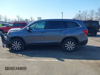 2021 Honda Pilot EX-L with VIN 5FNYF6H54MB028203, listed as a IAAI auction lot 41641116 with 46,755 mi miles and . Bid and sale history available at DreamBid. Image 14.