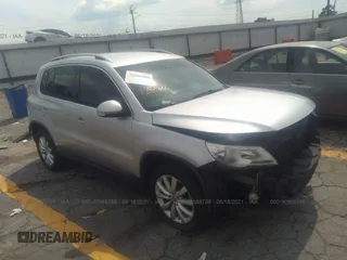 2011 Volkswagen Tiguan SE with VIN WVGAV7AX7BW505183, listed as a IAAI auction lot 35007073 with 154,481 mi miles and . Bid and sale history available at DreamBid. Image 1.