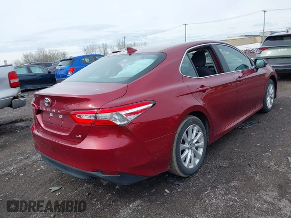 2019 Toyota Camry LE with VIN 4T1B11HK8KU823736, listed as a IAAI auction lot 42166696 with 21,732 mi miles and . Bid and sale history available at DreamBid. Image 4.