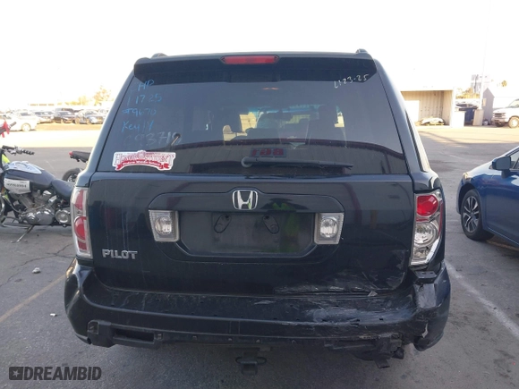2006 Honda Pilot EX-L with RES with VIN 5FNYF28616B029670, listed as a IAAI auction lot 41425494 with 206,756 mi miles. Bid and sale history available at carsss.com. Image 16.
