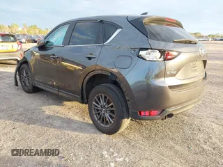 2019 Mazda CX-5 Touring with VIN JM3KFACM8K0694362, listed as a IAAI auction lot 41410185 with 89,443 mi miles. Bid and sale history available at carsss.com. Image 3.