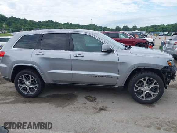 2018 Jeep Grand Cherokee Limited with VIN 1C4RJFBG7JC266715, listed as a IAAI auction lot 42562005 with 101,999 mi miles and . Bid and sale history available at DreamBid. Image 14.