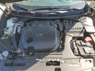 2018 Nissan Maxima SR z VIN 1N4AA6AP7JC401700, wystawiony jako Copart lot #53147045 z przebiegiem 105 502 mil mil oraz Szkoda całkowita • Salvage title. Historia ofert i sprzedaży dostępna na DreamBid. Obrazek 11.