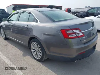 2013 Ford Taurus Limited z VIN 1FAHP2F8XDG185782, wystawiony jako IAAI lot #42474018 z przebiegiem 181 144 mil mil oraz . Historia ofert i sprzedaży dostępna na DreamBid. Obrazek 3.