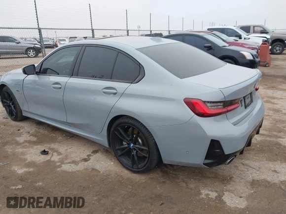 2023 BMW 3 Series 330e with VIN 3MW39FF00P8D57706, listed as a IAAI auction lot 41560259 with 1 mi miles. Bid and sale history available at carsss.com. Image 3.