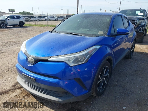 2018 Toyota C-HR XLE z VIN NMTKHMBX7JR004448, wystawiony jako IAAI lot #42785933 z przebiegiem 112 115 mil mil oraz . Historia ofert i sprzedaży dostępna na DreamBid. Obrazek 6.