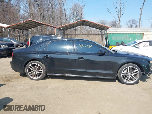 2017 Audi A8 with VIN WAU44AFDXHN004395, listed as a IAAI auction lot 41705688 with 63,282 mi miles and . Bid and sale history available at DreamBid. Image 13.