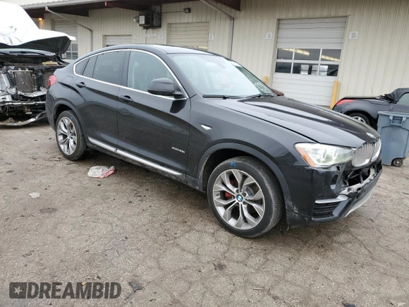 2015 BMW X4 xDrive35i with VIN 5UXXW5C56F0E88267, listed as a Copart auction lot 47888925 with 101,859 mi miles and Salvage title. Bid and sale history available at DreamBid. Image 4.