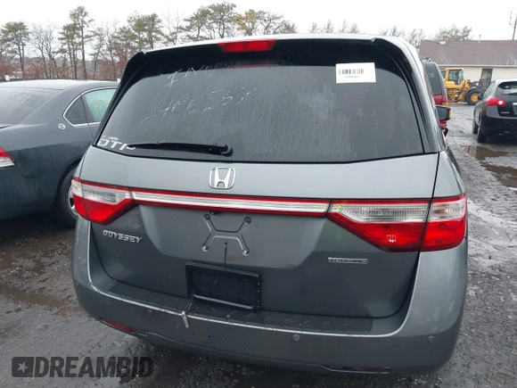 2012 Honda Odyssey Touring with VIN 5FNRL5H98CB089871, listed as a IAAI auction lot 41351447 with 999,999 mi miles. Bid and sale history available at carsss.com. Image 15.