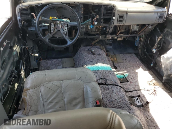 2002 Chevrolet Suburban LT with VIN 1GNFK16T32J242667, listed as a Copart auction lot 57413185 with Not provided miles and Salvage title. Bid and sale history available at DreamBid. Image 8.