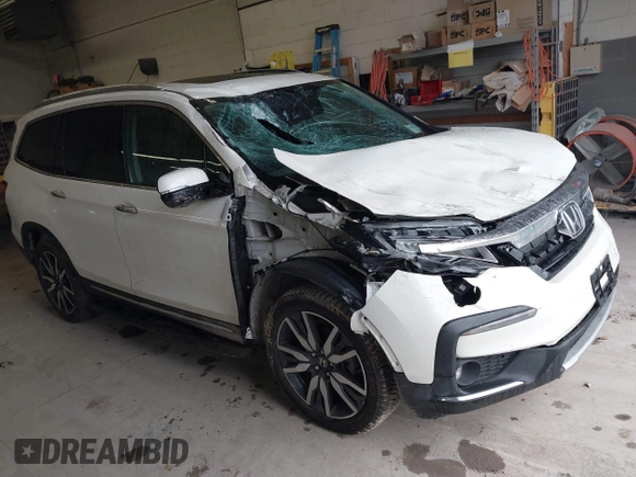 2019 Honda Pilot Elite with VIN 5FNYF6H08KB054725, listed as a IAAI auction lot 40496860 with 91,284 mi miles and . Bid and sale history available at DreamBid. Image 1.