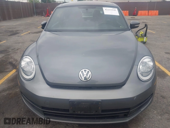 2013 Volkswagen Beetle 2.5L with VIN 3VWJP7AT6DM667477, listed as a IAAI auction lot 42215545 with 87,392 mi miles and . Bid and sale history available at DreamBid. Image 12.