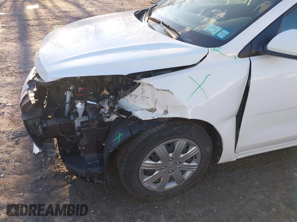 2022 Kia Rio S with VIN 3KPA25AD5NE443465, listed as a IAAI auction lot 41230852 with 20,460 mi miles and . Bid and sale history available at DreamBid. Image 17.