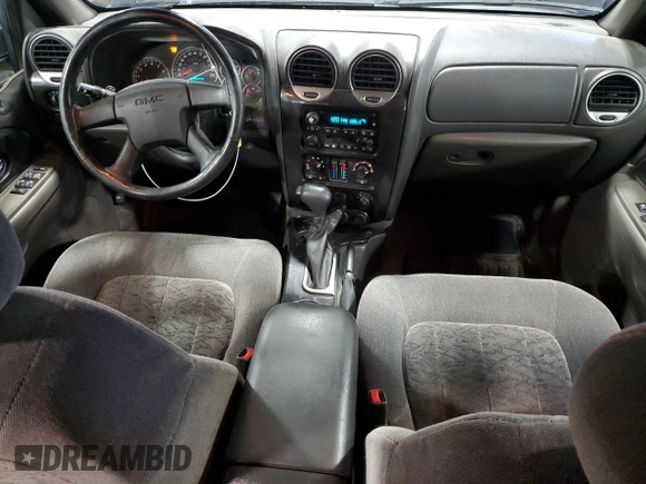 2004 GMC Envoy SLT with VIN 1GKDT13S642191868, listed as a Copart auction lot 82334304 with 150,810 mi miles and Salvage Title. Bid and sale history available at carsss.com. Image 8.