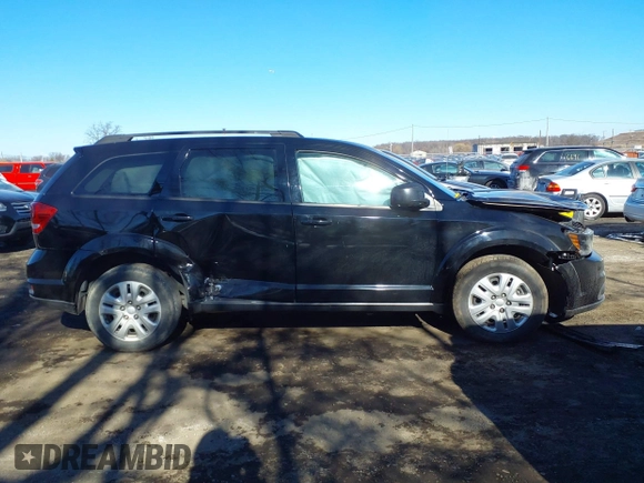 2019 Dodge Journey SE with VIN 3C4PDCBG6KT874924, listed as a IAAI auction lot 41426744 with 60,479 mi miles and . Bid and sale history available at DreamBid. Image 14.