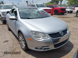 2009 Volkswagen Eos Komfort with VIN WVWBA71F49V016543, listed as a IAAI auction lot 42029360 with 76,657 mi miles and . Bid and sale history available at DreamBid. Image 1.