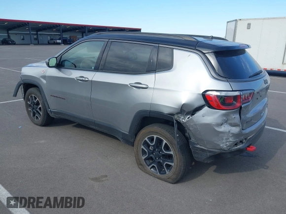 2019 Jeep Compass Trailhawk z VIN 3C4NJDDB6KT722424, wystawiony jako IAAI lot #42270528 z przebiegiem 98 007 mil mil oraz . Historia ofert i sprzedaży dostępna na DreamBid. Obrazek 3.