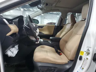 2019 Toyota RAV4 Hybrid XLE with VIN 2T3RWRFV1KW016526, listed as a Copart auction lot 61466435 with 64,255 mi miles and Salvage title. Bid and sale history available at DreamBid. Image 7.