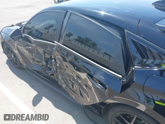 2023 Honda Civic Sport with VIN 19XFL2H84PE001354, listed as a IAAI auction lot 42053691 with 34,127 mi miles and . Bid and sale history available at DreamBid. Image 6.