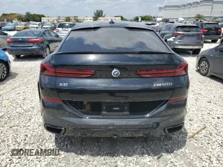 2023 BMW X6 M50i z VIN 5UXCY8C02P9P48141, wystawiony jako Copart lot #52531895 z przebiegiem 33 764 mil mil oraz Szkody całkowita. Historia ofert i sprzedaży dostępna na DreamBid. Obrazek 6.
