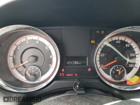 2013 Dodge Grand Caravan SE with VIN 2C4RDGBG3DR560962, listed as a Copart auction lot 53690225 with 124,796 mi miles and Salvage Title. Bid and sale history available at DreamBid. Image 9.