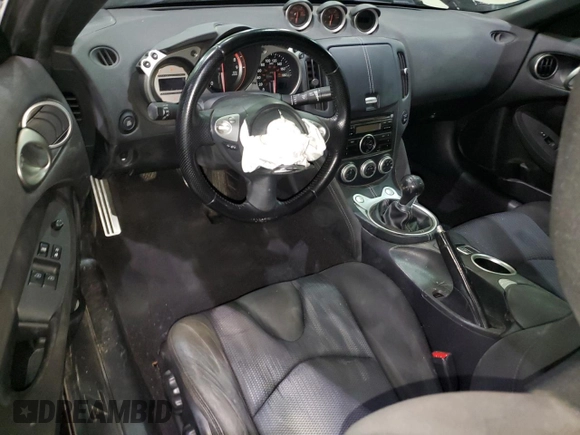 2010 Nissan 370Z Touring с VIN JN1AZ4FH9AM304066, выставлен на аукционе Copart как лот 84176404 с пробегом Не указан миль и На запчасти • Non repairable. История ставок и продаж доступна на DreamBid. Изображение 8.