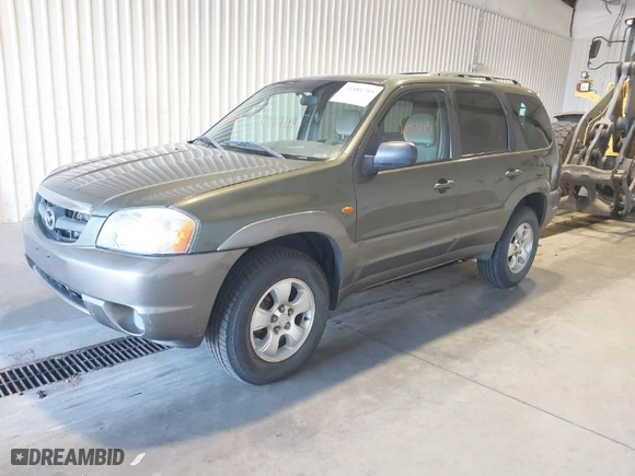 2002 Mazda Tribute LX with VIN 4F2YU08192KM65677, listed as a IAAI auction lot 41881715 with 131,837 mi miles. Bid and sale history available at carsss.com. Image 2.