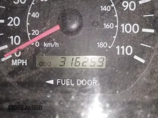 1999 Toyota Sienna LE with VIN 4T3ZF13C4XU166786, listed as a IAAI auction lot 42057995 with 316,259 mi miles. Bid and sale history available at carsss.com. Image 15.