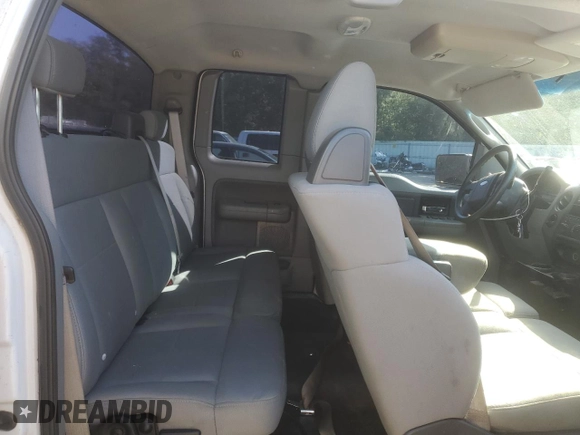 2007 Ford F-150 STX with VIN 1FTRX12W37NA05703, listed as a Copart auction lot 51927885 with 206,593 mi miles and Salvage Title. Bid and sale history available at DreamBid. Image 10.