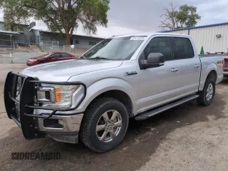 2018 Ford F-150 XL with VIN 1FTEW1E57JKC62666, listed as a Copart auction lot 61619235 with 149,759 mi miles and Clean title. Bid and sale history available at DreamBid. Image 1.