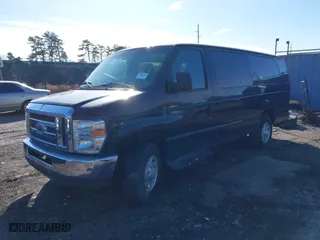 2014 Ford Econoline Wagon XL with VIN 1FBSS3BL1EDB21149, listed as a IAAI auction lot 41529261 with 999,999 mi miles. Bid and sale history available at carsss.com. Image 16.
