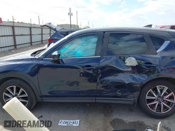 2018 Mazda CX-5 Touring with VIN JM3KFACM3J1370129, listed as a IAAI auction lot 41829027 with 71,305 mi miles. Bid and sale history available at carsss.com. Image 14.