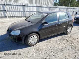 2009 Volkswagen Rabbit S с VIN WVWDA71K59W147903, выставлен на аукционе Copart как лот 76706654 с пробегом 73 297 миль миль и Списание • Salvage title. История ставок и продаж доступна на DreamBid. Изображение 1.