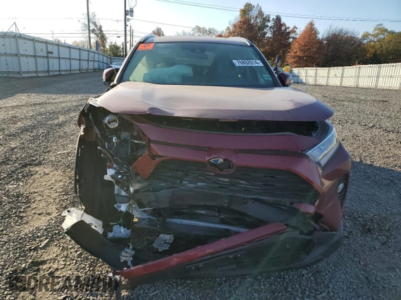 2021 Toyota RAV4 Hybrid XLE with VIN JTMRWRFV7MD130630, listed as a Copart auction lot 76802014 with 0 mi miles and Salvage Title. Bid and sale history available at carsss.com. Image 5.
