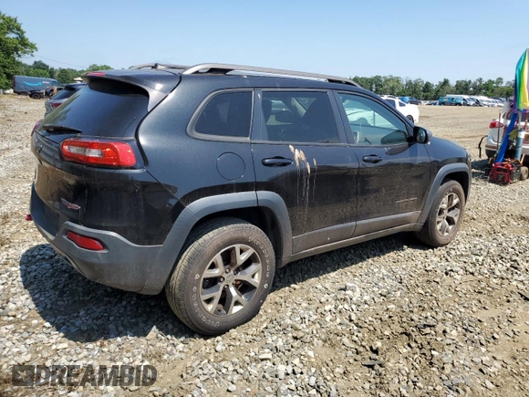 2015 Jeep Cherokee Trailhawk with VIN 1C4PJMBS6FW785891, listed as a Copart auction lot 61040565 with 156,421 mi miles and Clean title. Bid and sale history available at DreamBid. Image 3.