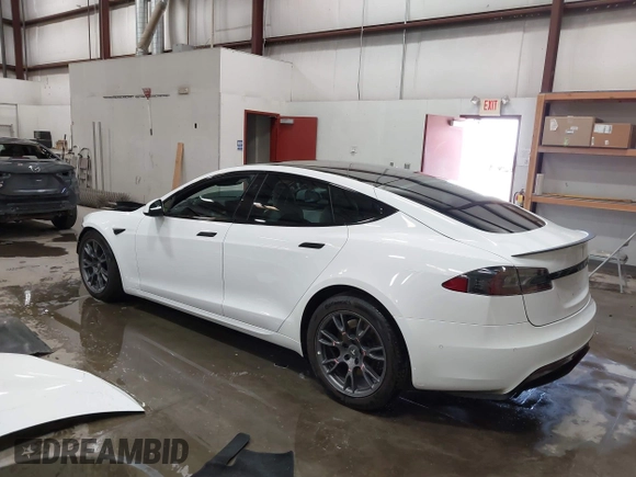 2022 Tesla Model S with VIN 5YJSA1E59NF469984, listed as a IAAI auction lot 42426490 with Not provided miles and . Bid and sale history available at DreamBid. Image 3.