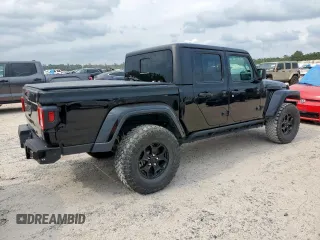 2023 Jeep Gladiator Freedom with VIN 1C6HJTAG7PL531273, listed as a Copart auction lot 56743255 with 41,226 mi miles and Salvage title. Bid and sale history available at DreamBid. Image 3.