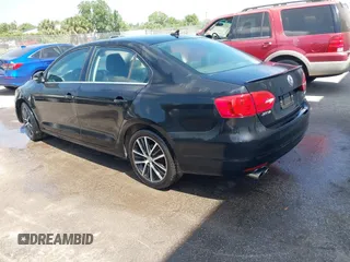 2013 Volkswagen Jetta Sedan SE with VIN 3VWDP7AJ2DM414880, listed as a IAAI auction lot 41652006 with 136,649 mi miles. Bid and sale history available at carsss.com. Image 3.