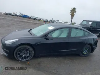 2023 Tesla Model 3 with VIN 5YJ3E1EA0PF587656, listed as a IAAI auction lot 41489586 with 12,844 mi miles and . Bid and sale history available at DreamBid. Image 15.