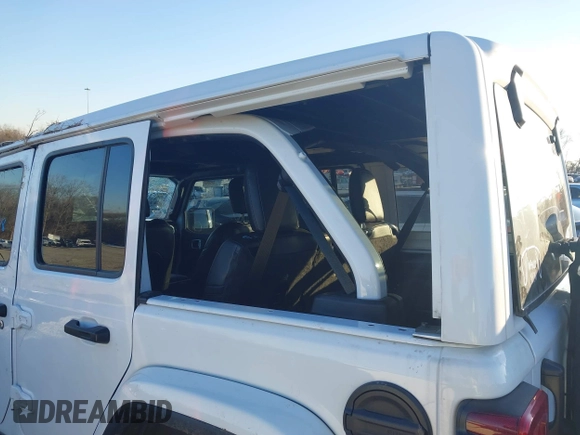 2021 Jeep Wrangler Unlimited Sahara with VIN 1C4HJXEG1MW597905, listed as a IAAI auction lot 41327138 with Not provided miles and . Bid and sale history available at DreamBid. Image 18.
