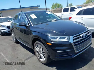 2018 Audi Q5 Premium Plus z VIN WA1BNAFY7J2094777, wystawiony jako IAAI lot #42265300 z przebiegiem Nie podano mil oraz . Historia ofert i sprzedaży dostępna na DreamBid. Obrazek 13.