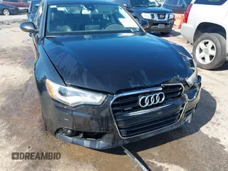 2013 Audi A6 Premium Plus with VIN WAUGGAFC7DN155006, listed as a IAAI auction lot 42535357 with 163,235 mi miles and . Bid and sale history available at DreamBid. Image 6.