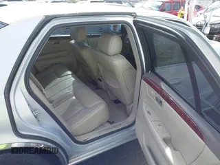 2006 Cadillac DTS w/1SC with VIN 1G6KD57Y56U101903, listed as a IAAI auction lot 41710160 with 151,057 mi miles. Bid and sale history available at carsss.com. Image 8.