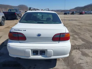 2003 Chevrolet Malibu LS with VIN 1G1NE52J53M622092, listed as a IAAI auction lot 41738623 with 93,092 mi miles. Bid and sale history available at carsss.com. Image 16.