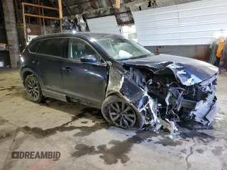 2021 Mazda CX-9 Touring with VIN JM3TCBCY2M0517749, listed as a Copart auction lot 42396215 with 46,768 mi miles and Salvage Title. Bid and sale history available at carsss.com. Image 4.