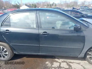2004 Toyota Corolla CE with VIN 1NXBR32E34Z282167, listed as a IAAI auction lot 41832630 with 174,061 mi miles. Bid and sale history available at carsss.com. Image 13.