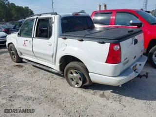 2005 Ford Explorer Sport Trac XLS with VIN 1FMZU67K15UA48284, listed as a IAAI auction lot 41430056 with 279,584 mi miles. Bid and sale history available at carsss.com. Image 3.