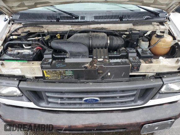 2004 Ford Econoline Cargo with VIN 1FTNE24L04HA33417, listed as a Copart auction lot 85720904 with 129,070 mi miles and Salvage title. Bid and sale history available at DreamBid. Image 13.
