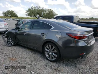 2020 Mazda 6 Signature with VIN JM1GL1XY5L1525321, listed as a Copart auction lot 56768673 with 41,481 mi miles and . Bid and sale history available at DreamBid. Image 2.